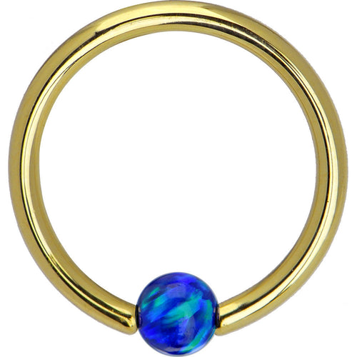 BodyCandy 14G 3/8 Solid 14K Gold Dark Blue Synthetic Opal Captive Ring — detail close-up