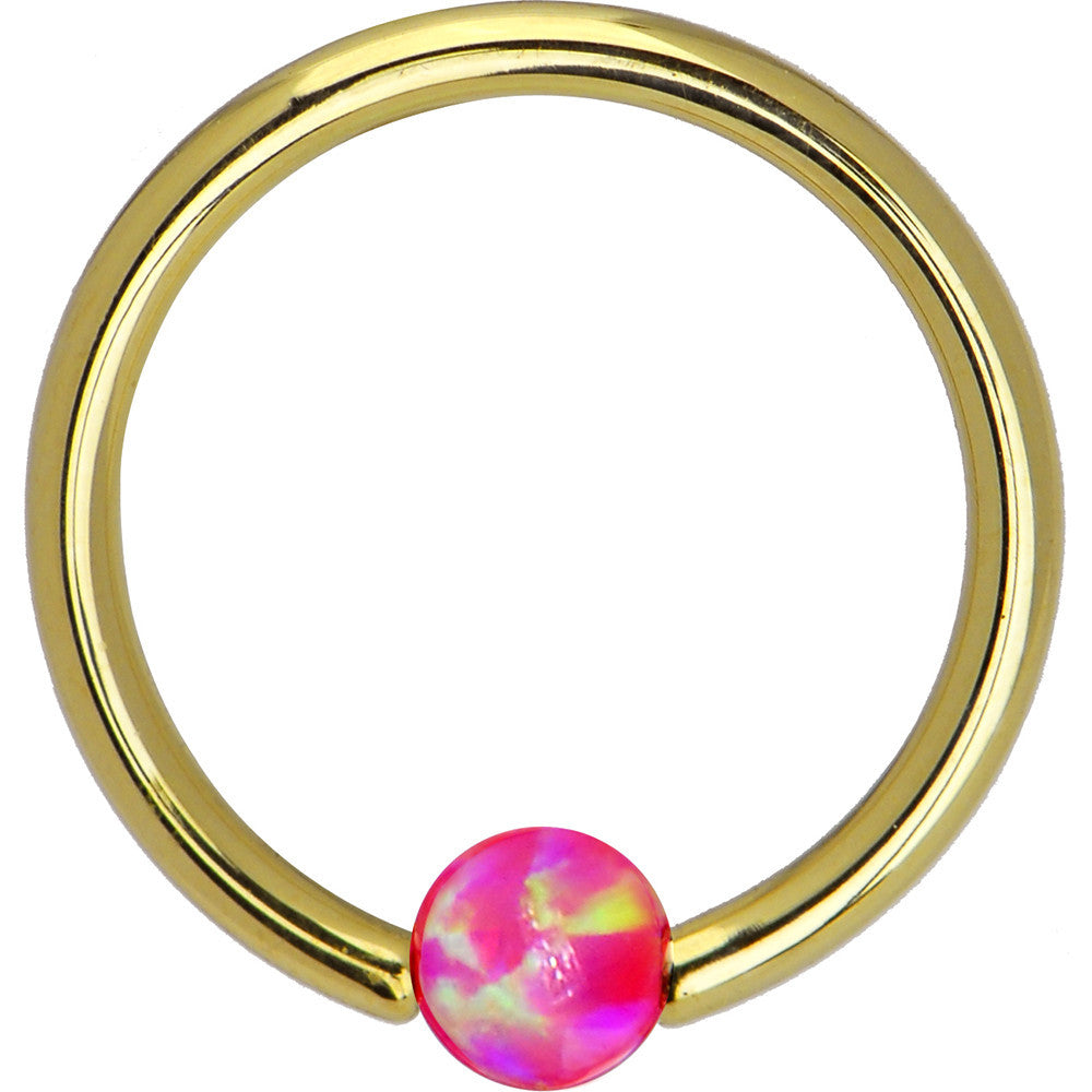 BodyCandy 14G 3/8 Solid 14K Yellow Gold Pink Synthetic Opal Captive Ring — detail close-up