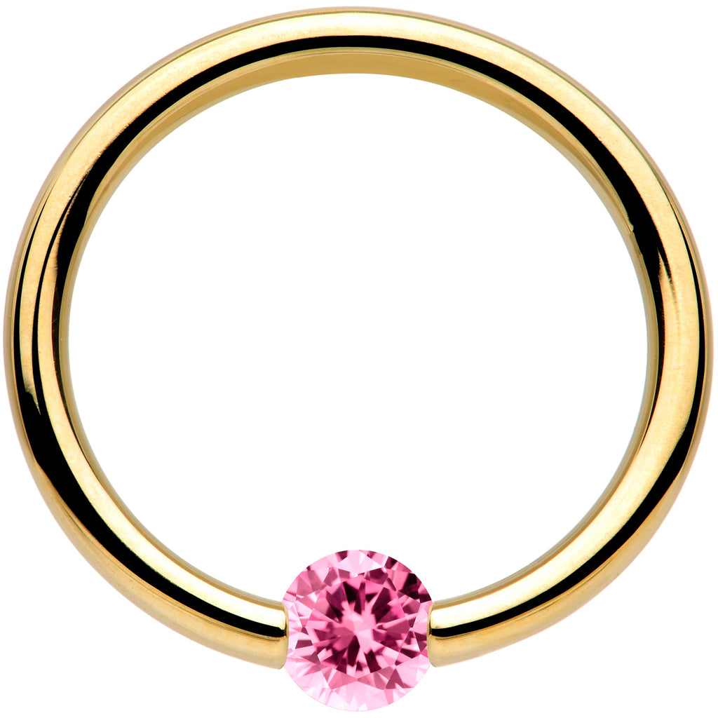 BodyCandy 16G 3/8 Solid 14k Yellow Gold 3mm Pink Cubic Zirconia Tension Captive Ring — detail close-up