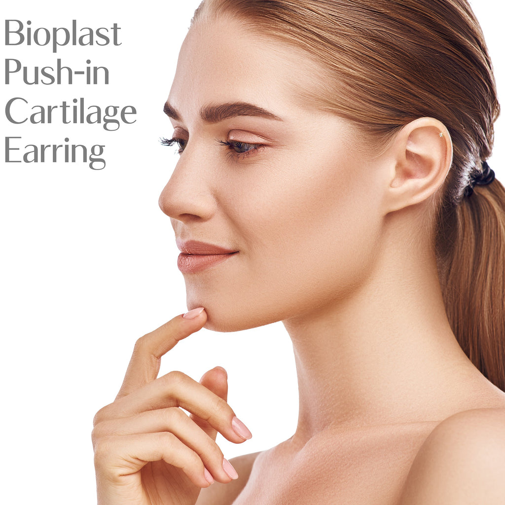 BodyCandy 16G 1/4 Solid 14K Yellow Gold 1.5mm CZ Bioplast Push in Cartilage Earring — lifestyle context