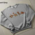 Pasimax Gingerbread Dinosaur Christmas Embroidered Sweatshirt – Funny Holiday Crewneck — main product shot