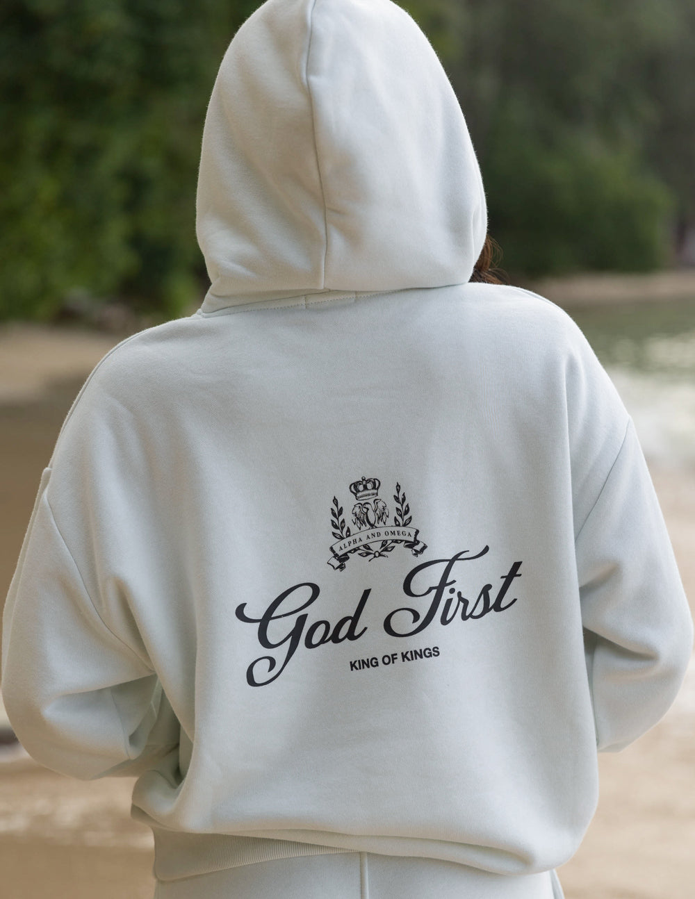 Elevated Faith God First Unisex Hoodie — back view