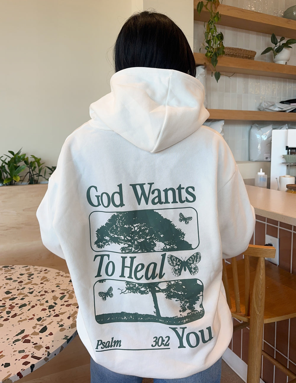 Elevated Faith God Heals Unisex Hoodie — main product shot