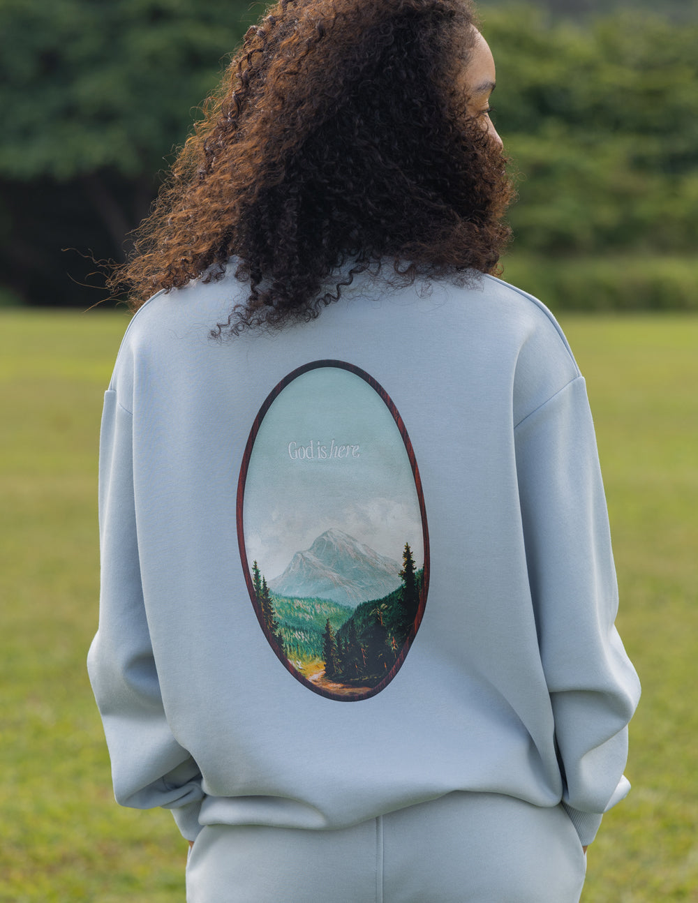 Elevated Faith God Is Here Unisex Crewneck — main product shot