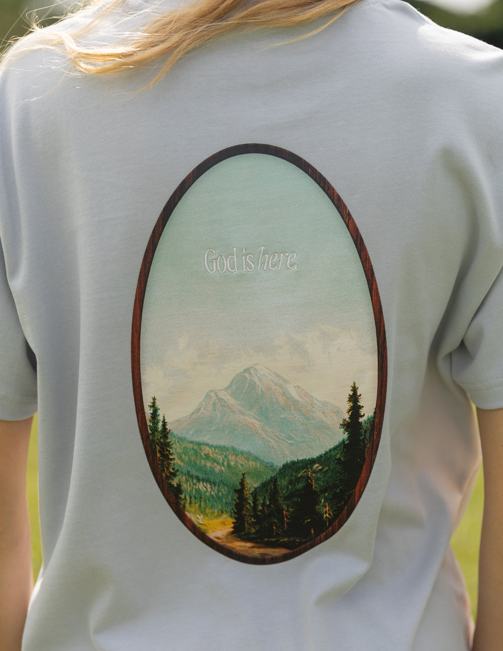 Elevated Faith God Is Here Unisex Tee — construction detail