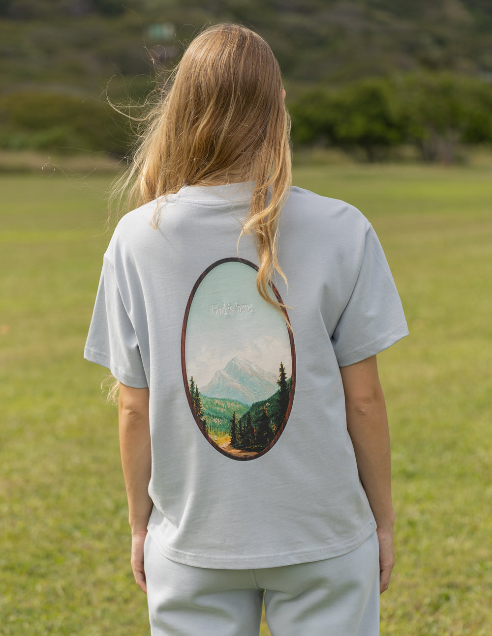 Elevated Faith God Is Here Unisex Tee — t-shirt category context