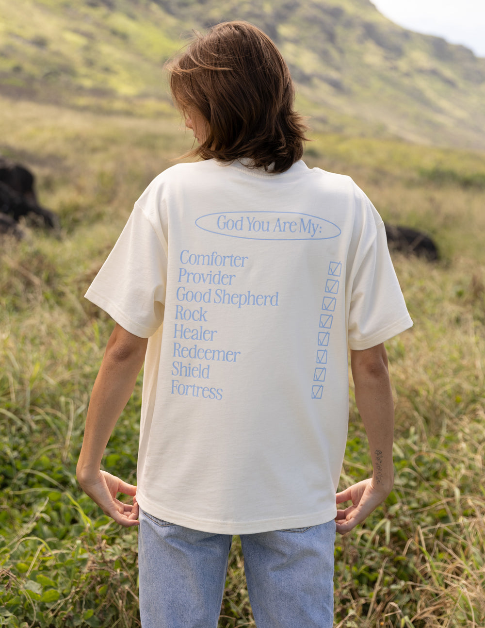 Elevated Faith God Is My Everything Unisex Tee — Elevated Faith branding close-up