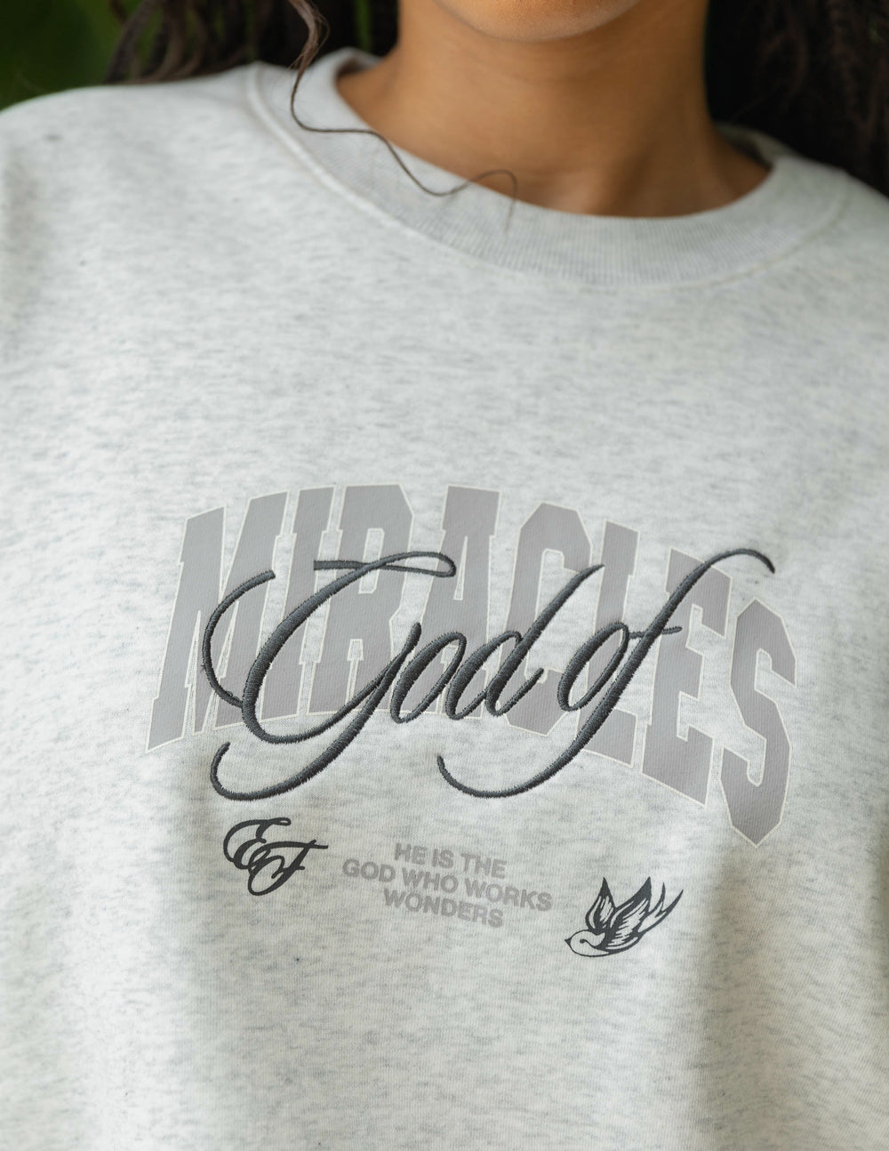 Elevated Faith God of Miracles Unisex Crewneck — side view