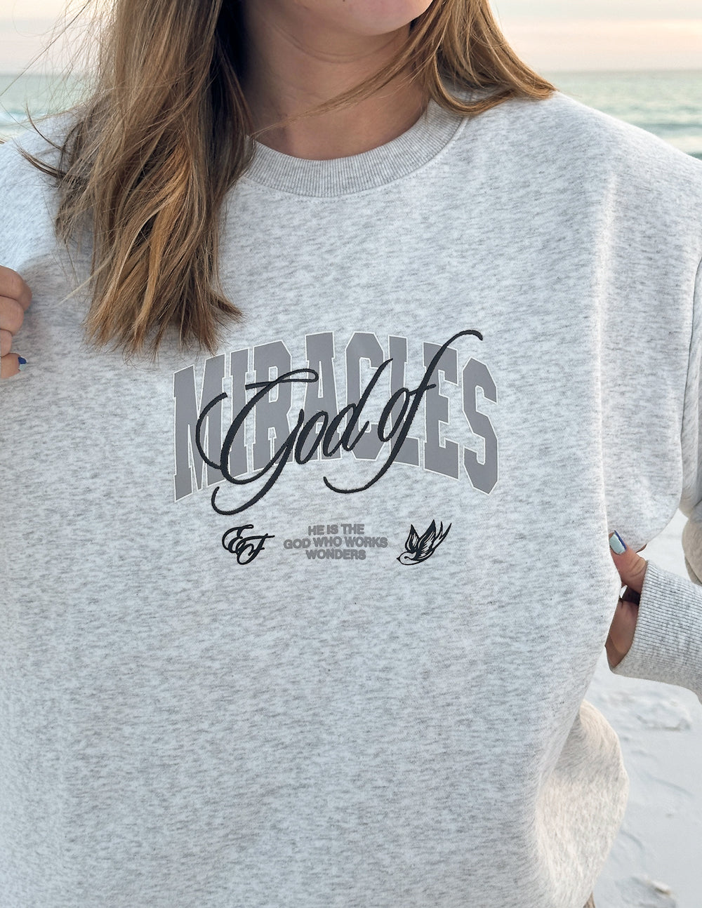 Elevated Faith God of Miracles Unisex Crewneck — size reference