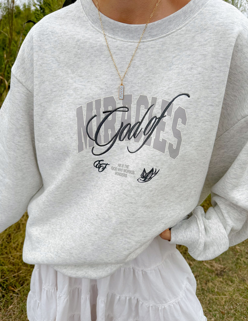 Elevated Faith God of Miracles Unisex Crewneck — detail close-up