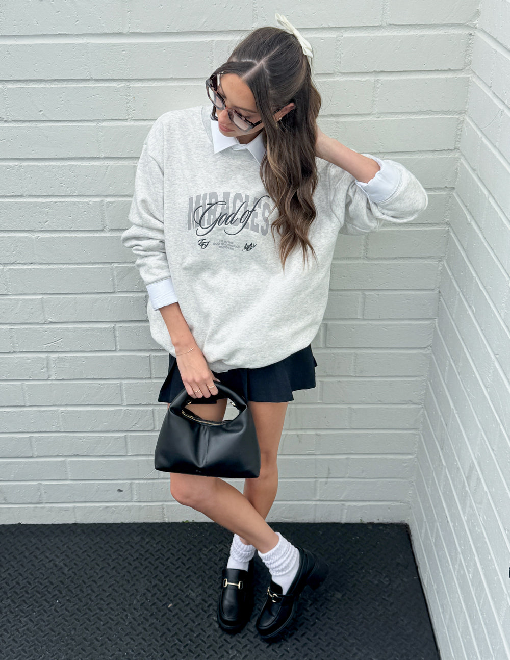 Elevated Faith God of Miracles Unisex Crewneck — packaging