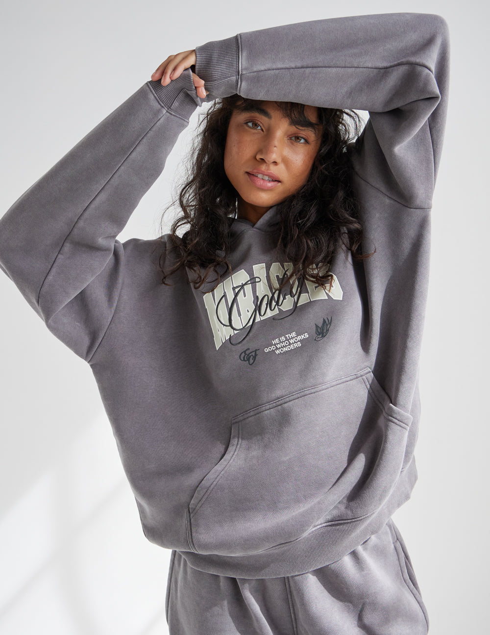 Elevated Faith God of Miracles Unisex Hoodie — main product shot