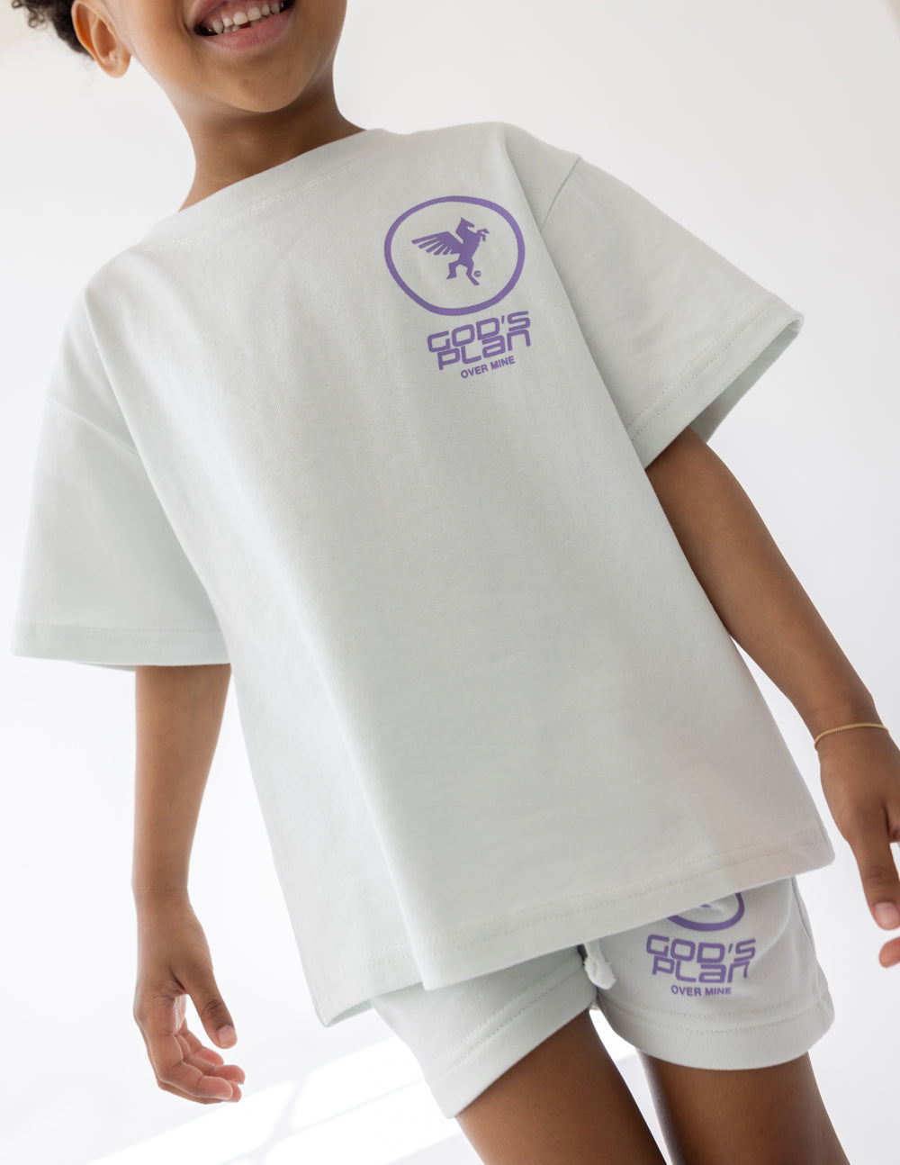 Elevated Faith God's Plan Racing Kids Tee — lifestyle context