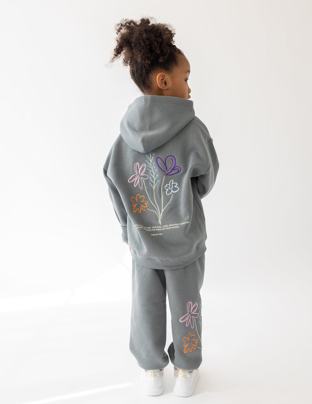 Elevated Faith God's Still Working Kids Hoodie — main product shot