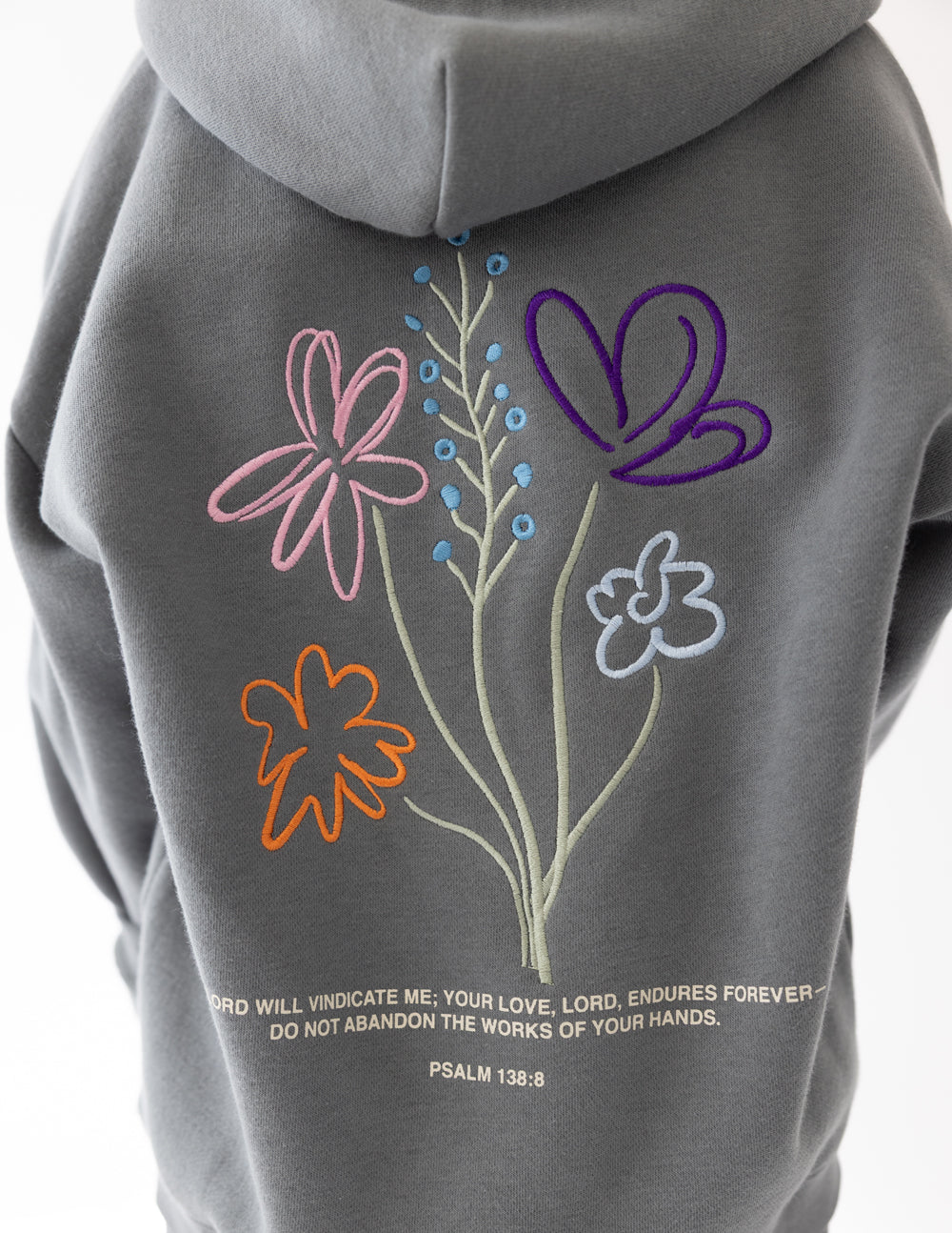 Elevated Faith God's Still Working Kids Hoodie — back view