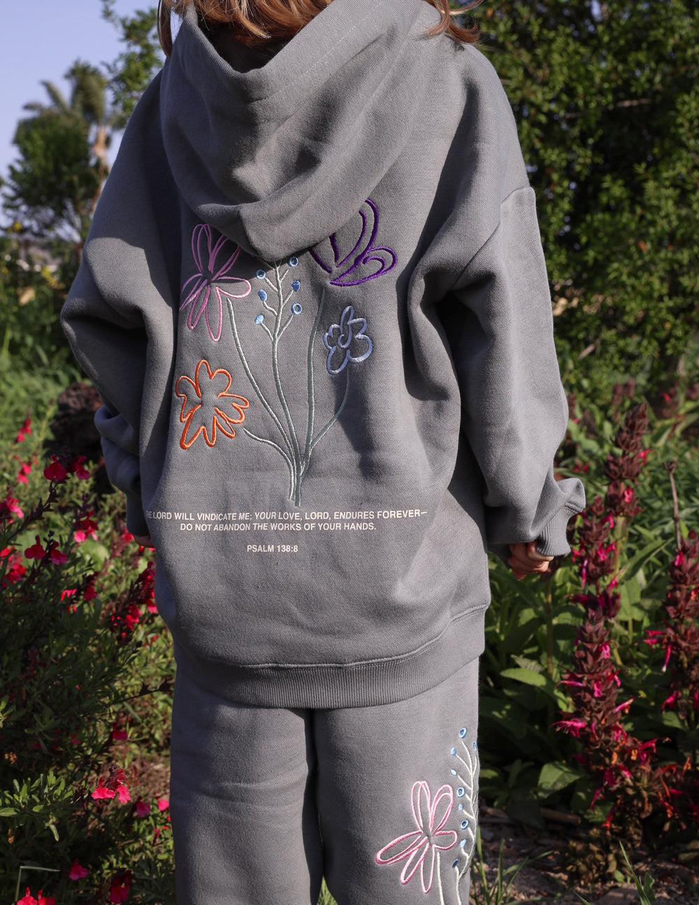 Elevated Faith God's Still Working Kids Hoodie — comparison shot