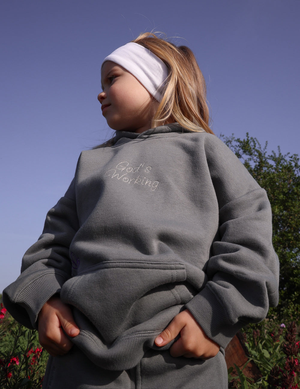 Elevated Faith God's Still Working Kids Hoodie — fabric or material detail