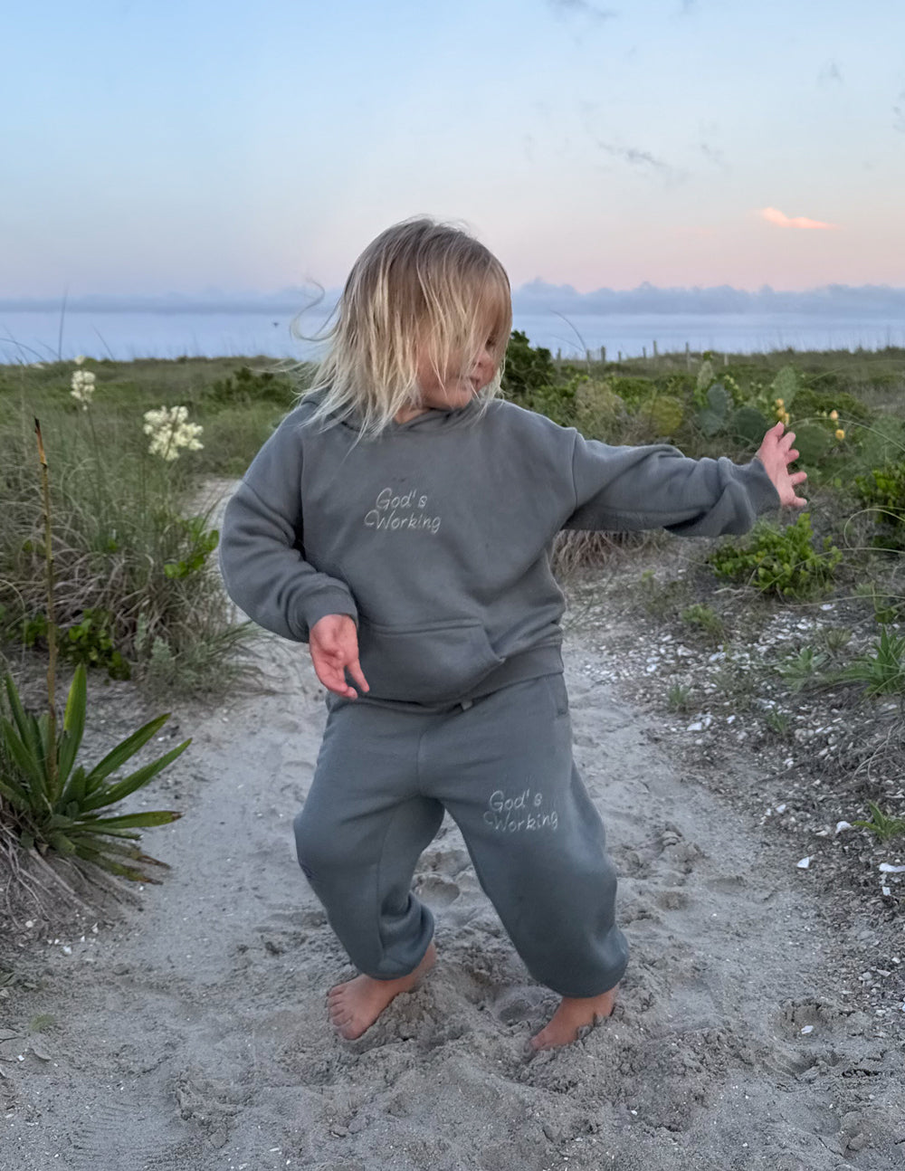 Elevated Faith God's Still Working Kids Hoodie — color detail