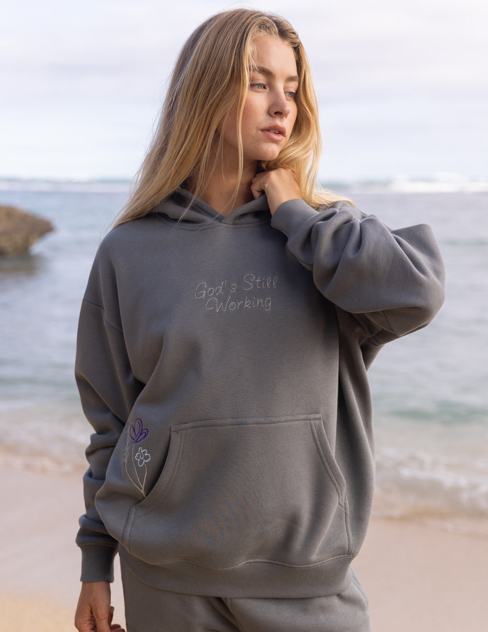 Elevated Faith God's Still Working Unisex Hoodie — construction detail