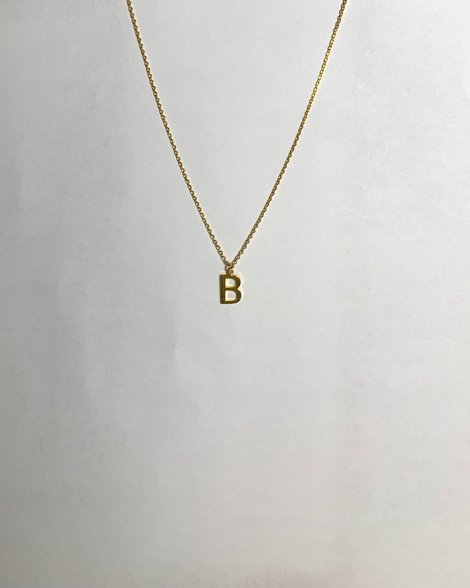 KADOU BOUTIQUE Letter Pendent Necklace — main product shot