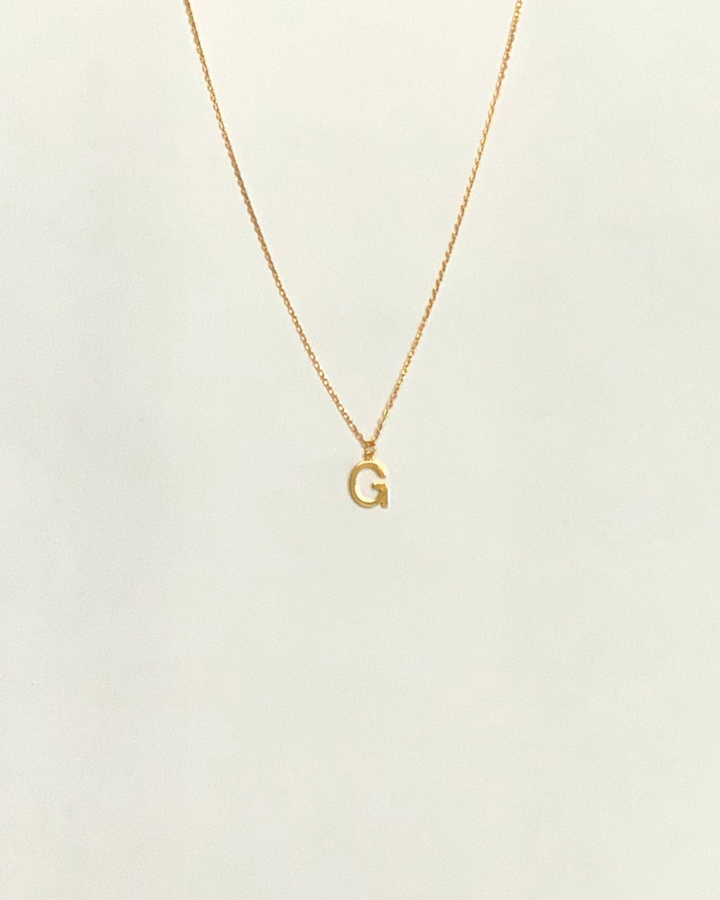 KADOU BOUTIQUE Letter Pendent Necklace — fabric or material detail