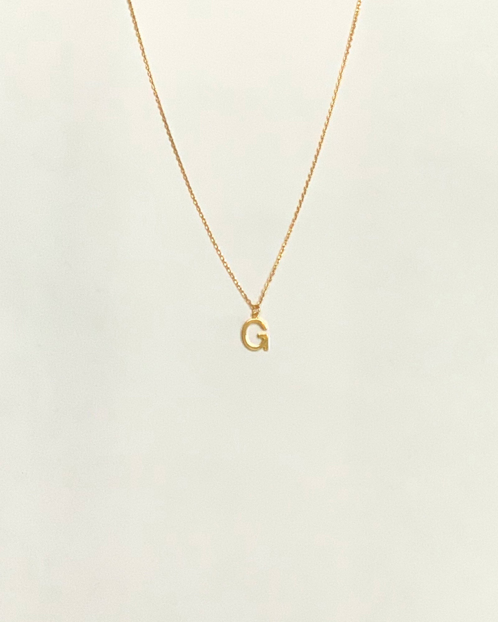 KADOU BOUTIQUE Letter Pendent Necklace — fabric or material detail