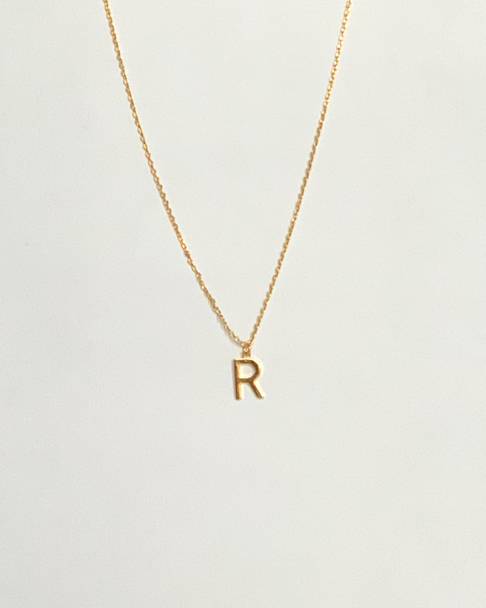 KADOU BOUTIQUE Letter Pendent Necklace — product on model