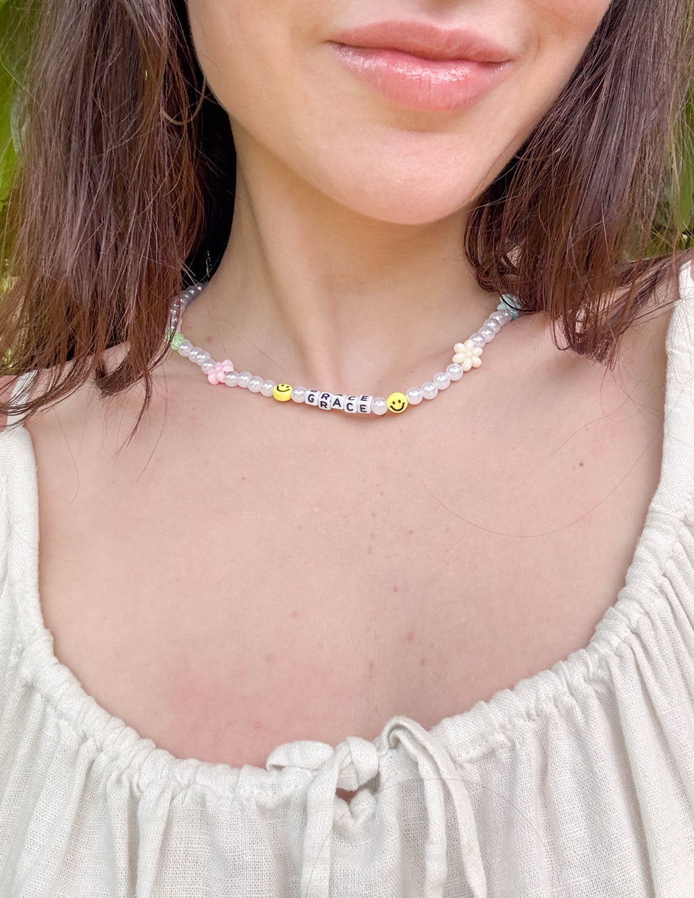 Elevated Faith Grace Letter Necklace — side view