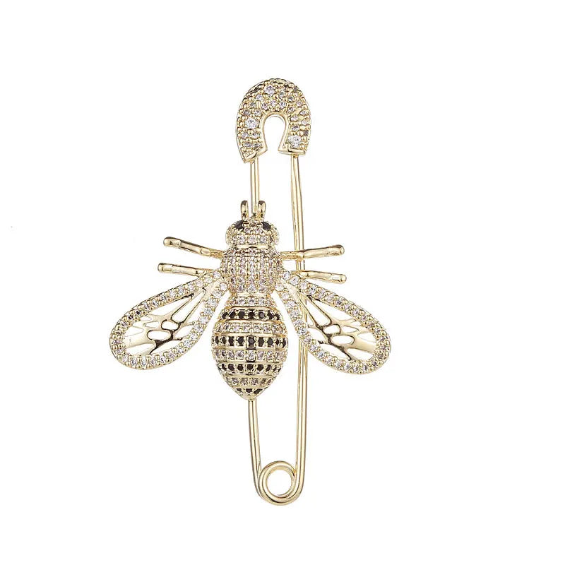 Envy NYC Envy NYC Luxury Full Crystal Gold Color Bee Brooch — Envy NYC branding close-up