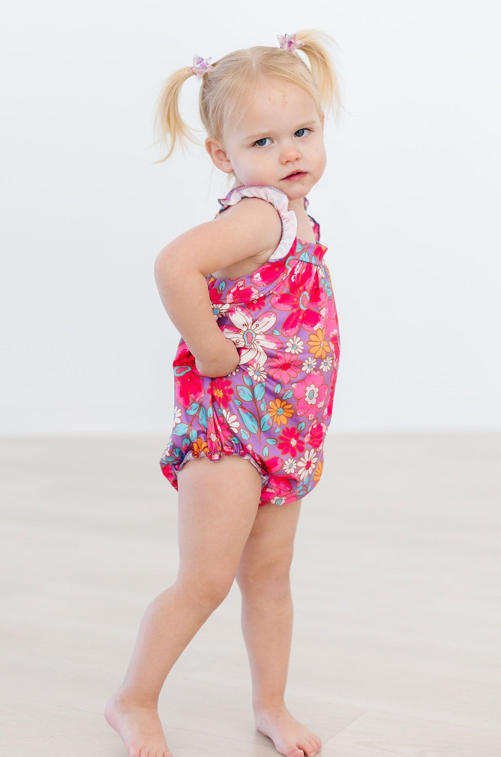 Mila & Rose ® Hawaiian Floral Ruffle Cross Back Romper — side view