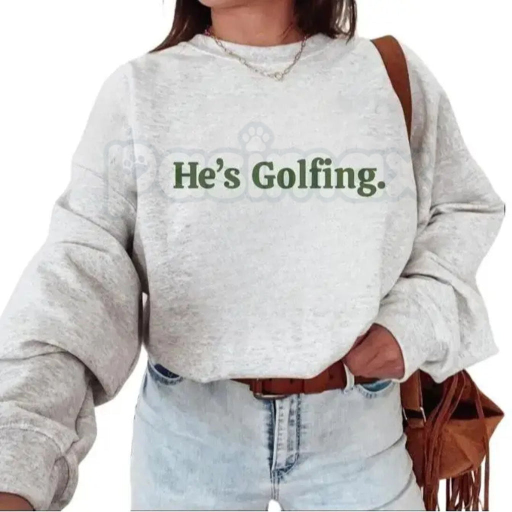 He’s Golfing Sweatshirt | Funny Golf Widow Crewneck | Humorous Country Club Pullover | Sarcastic Weekend Golfer Jumper | Aesthetic Golf Humor Shirt | Soft Cozy Sporty Lifestyle Top