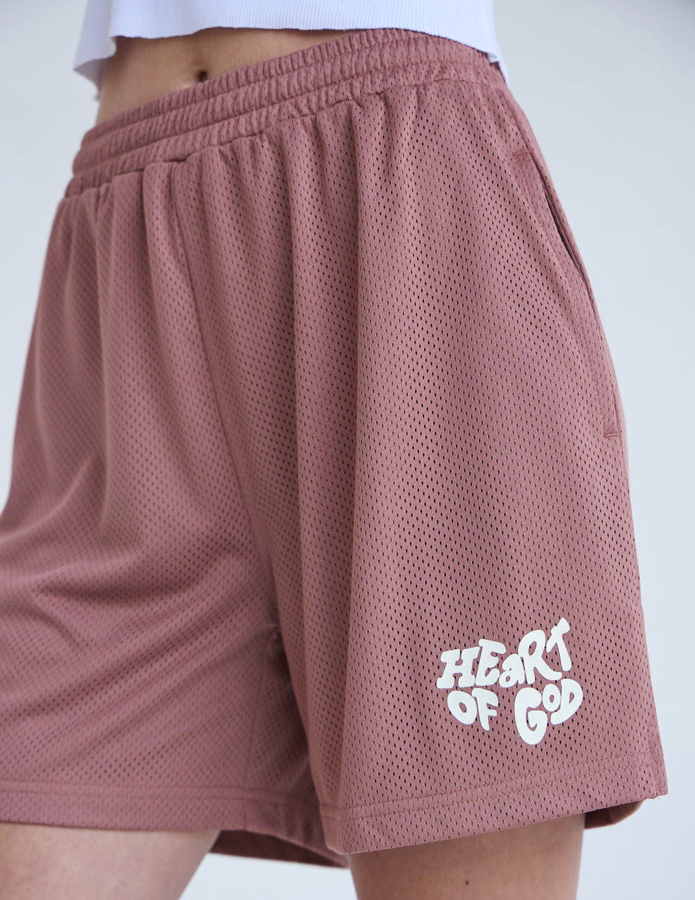 Elevated Faith Heart of God Unisex Mesh Short — lifestyle context