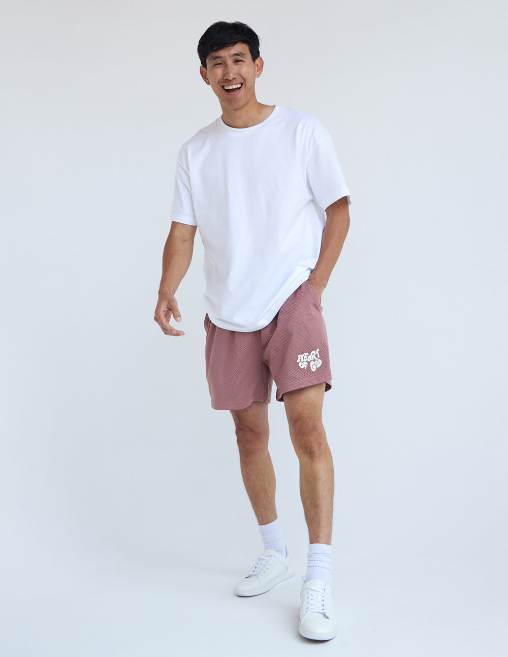 Elevated Faith Heart of God Unisex Mesh Short — back view