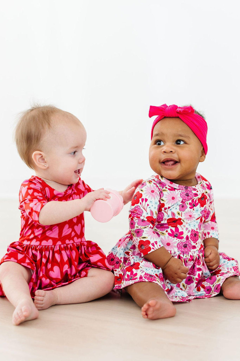 Mila & Rose ® Hearts & Hugs 3/4 Sleeve Twirl Bodysuit — detail close-up