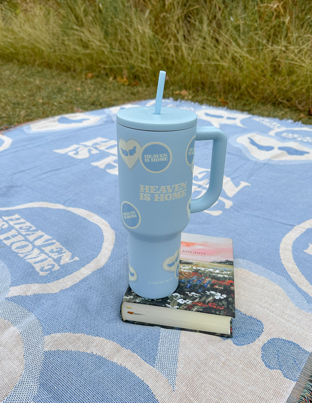 Elevated Faith Heaven Is Home 40 oz Ascend Tumbler — in-use photo