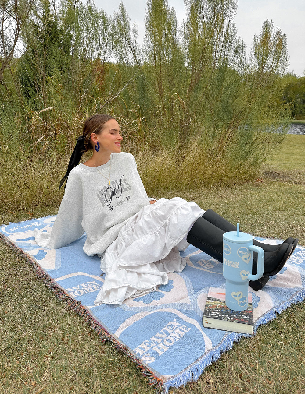 Elevated Faith Heaven Is Home Throw Blanket — in-use photo