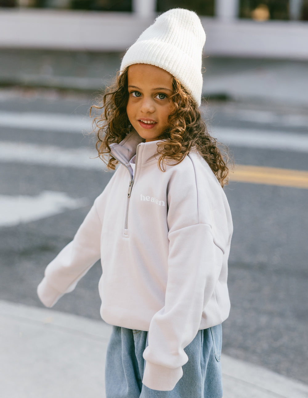 Elevated Faith Heaven Kids Half-Zip — Elevated Faith branding close-up