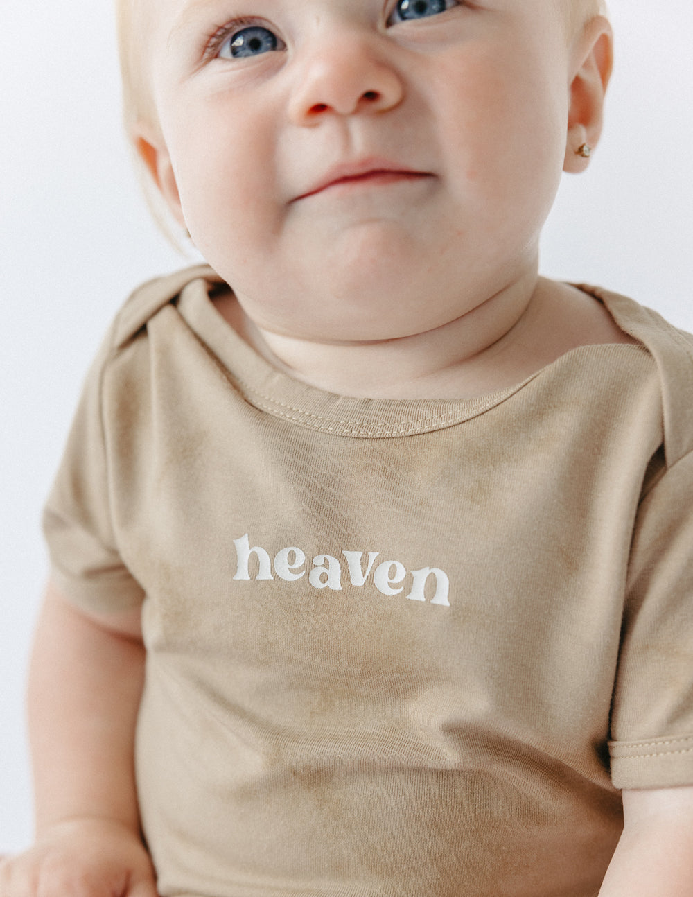 Elevated Faith Heaven Onesie — detail close-up