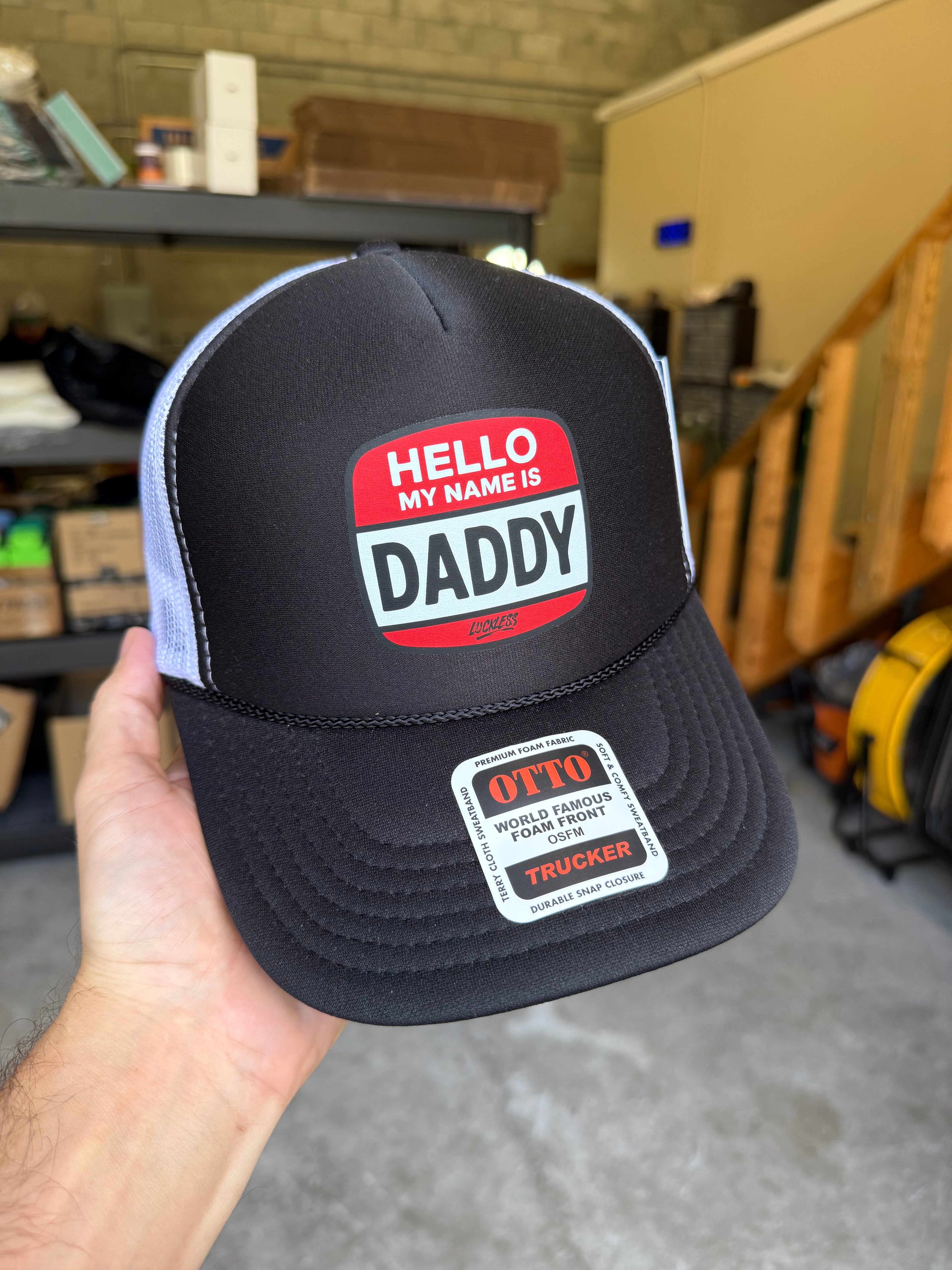 Luckless Outfitters Hello My Name is Daddy Trucker Hat — lifestyle context