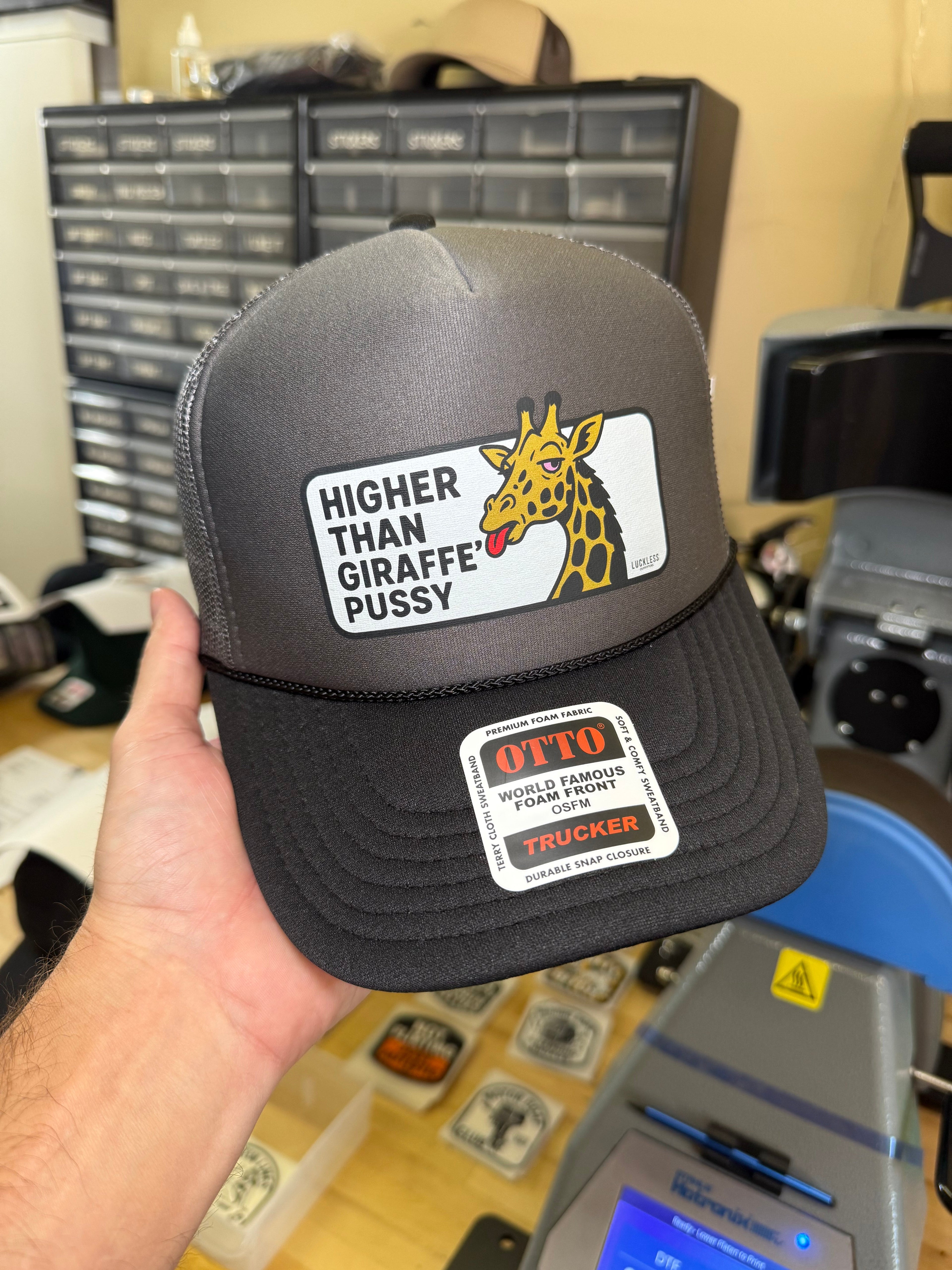 Luckless Outfitters Higher Than Giraffe Pussy Trucker Hat — detail close-up