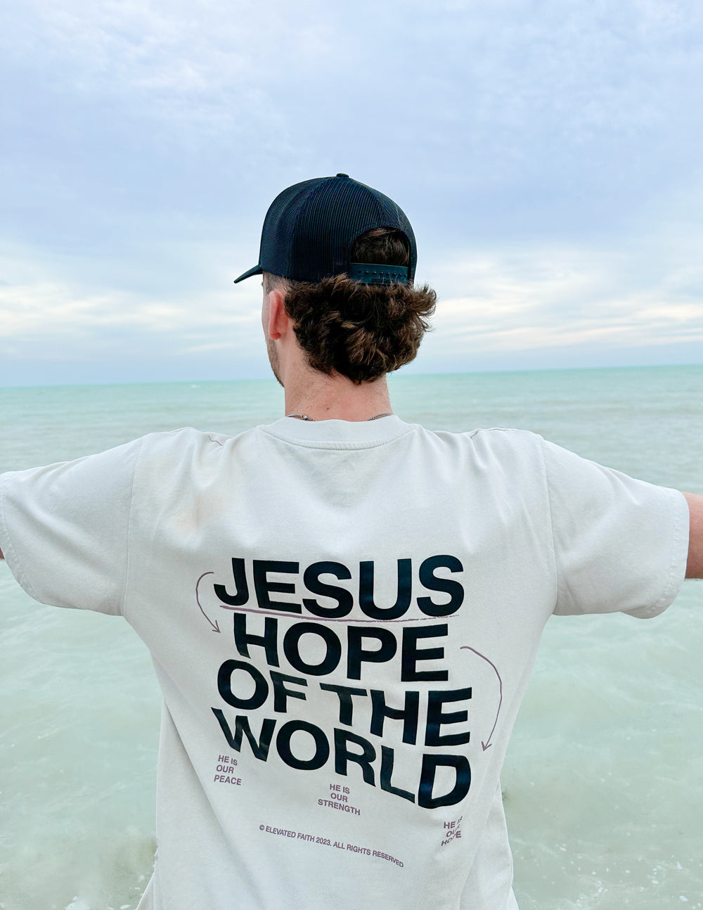 Elevated Faith Hope of the World Unisex Tee — side view