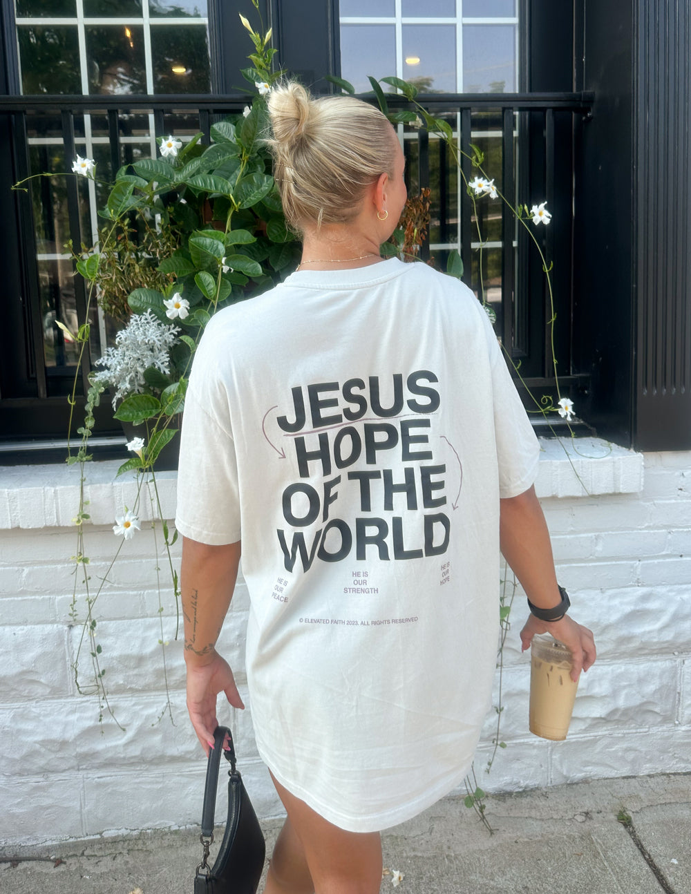 Elevated Faith Hope of the World Unisex Tee — side view