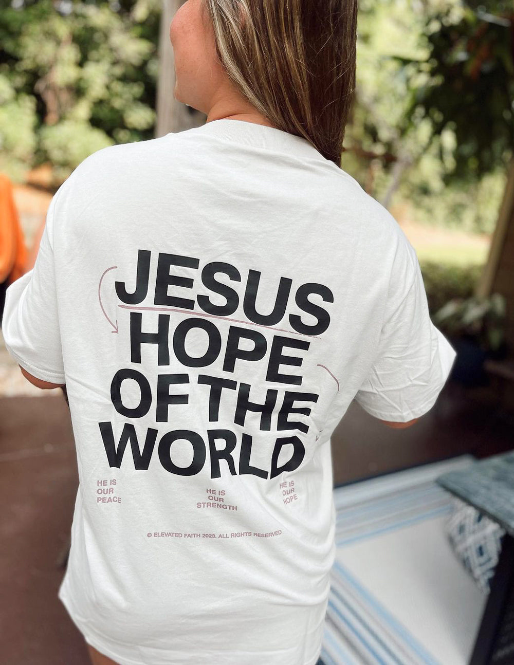 Elevated Faith Hope of the World Unisex Tee — packaging