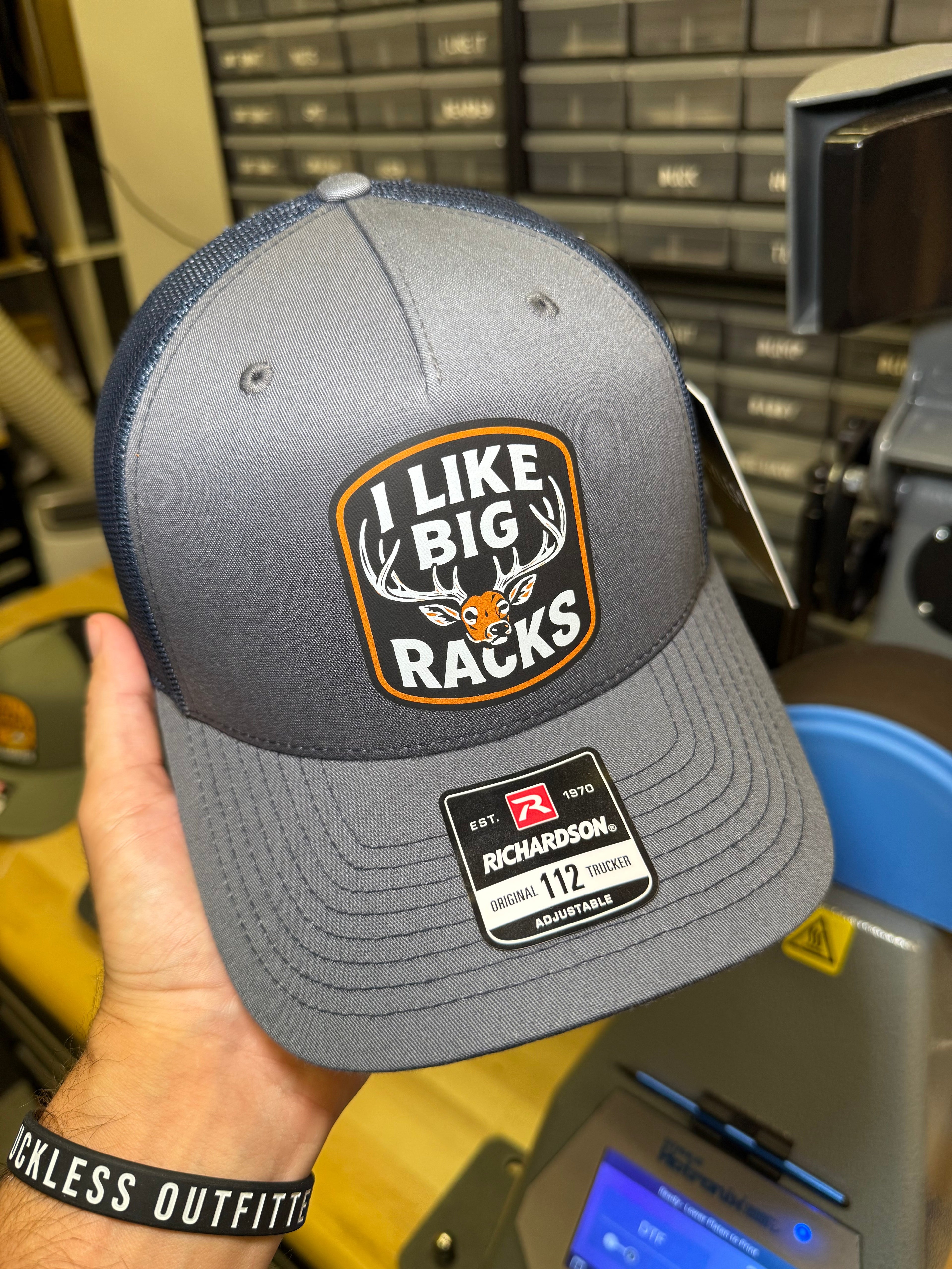 Luckless Outfitters I Like Big Racks Trucker Hat — detail close-up