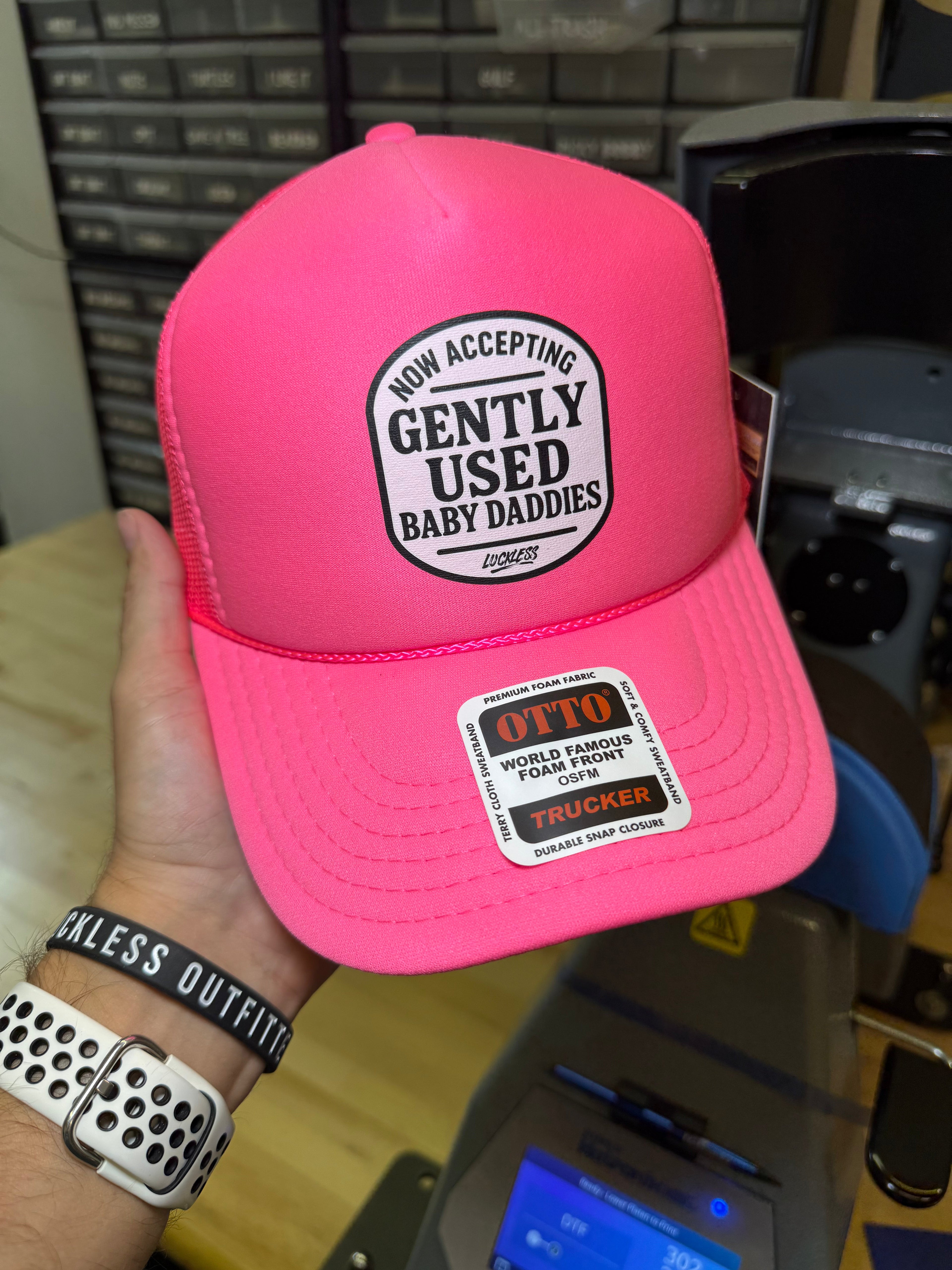 Luckless Outfitters Now Accepting Gently Used Baby Daddies Trucker Hat — detail close-up
