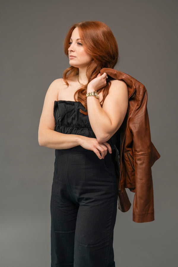 Pretty Little Patriot Black Ruffled Capri Jumpsuit — lifestyle worn / used context