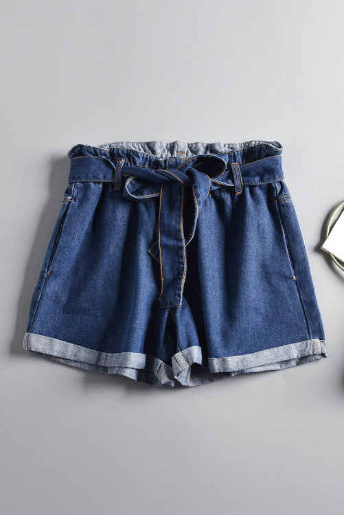 Pretty Little Patriot Pretty Little Patriot Denim Slouch Waist Shorts — Pretty Little Patriot branding close-up