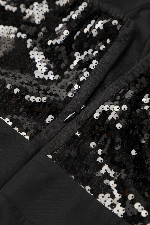 Pretty Little Patriot Pretty Little Patriot Black Sequin Jumpsuit — Pretty Little Patriot branding close-up