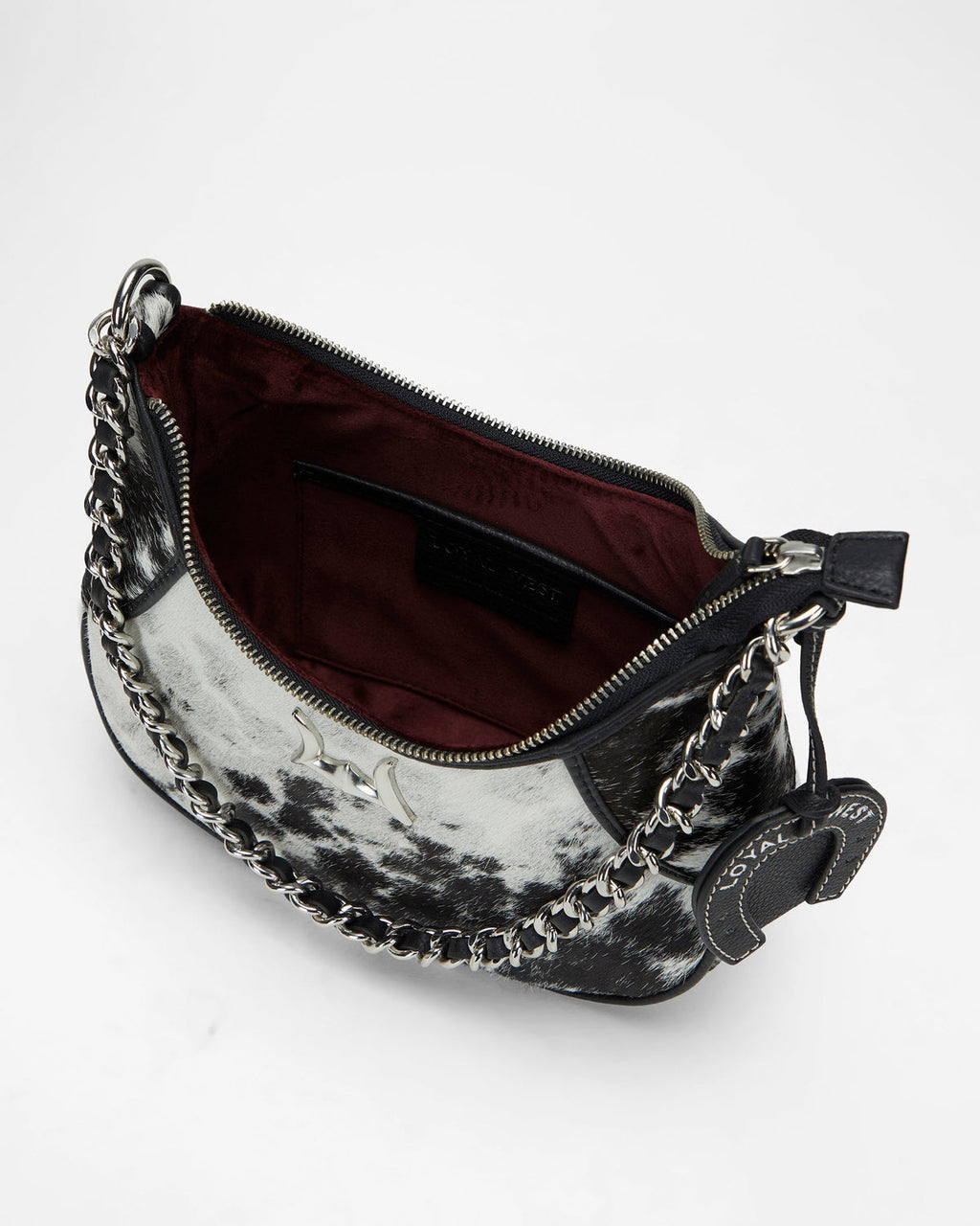 Whiskey Black & Co Lueve Hair-On Leather Bag — hand-finished craftsmanship close-up