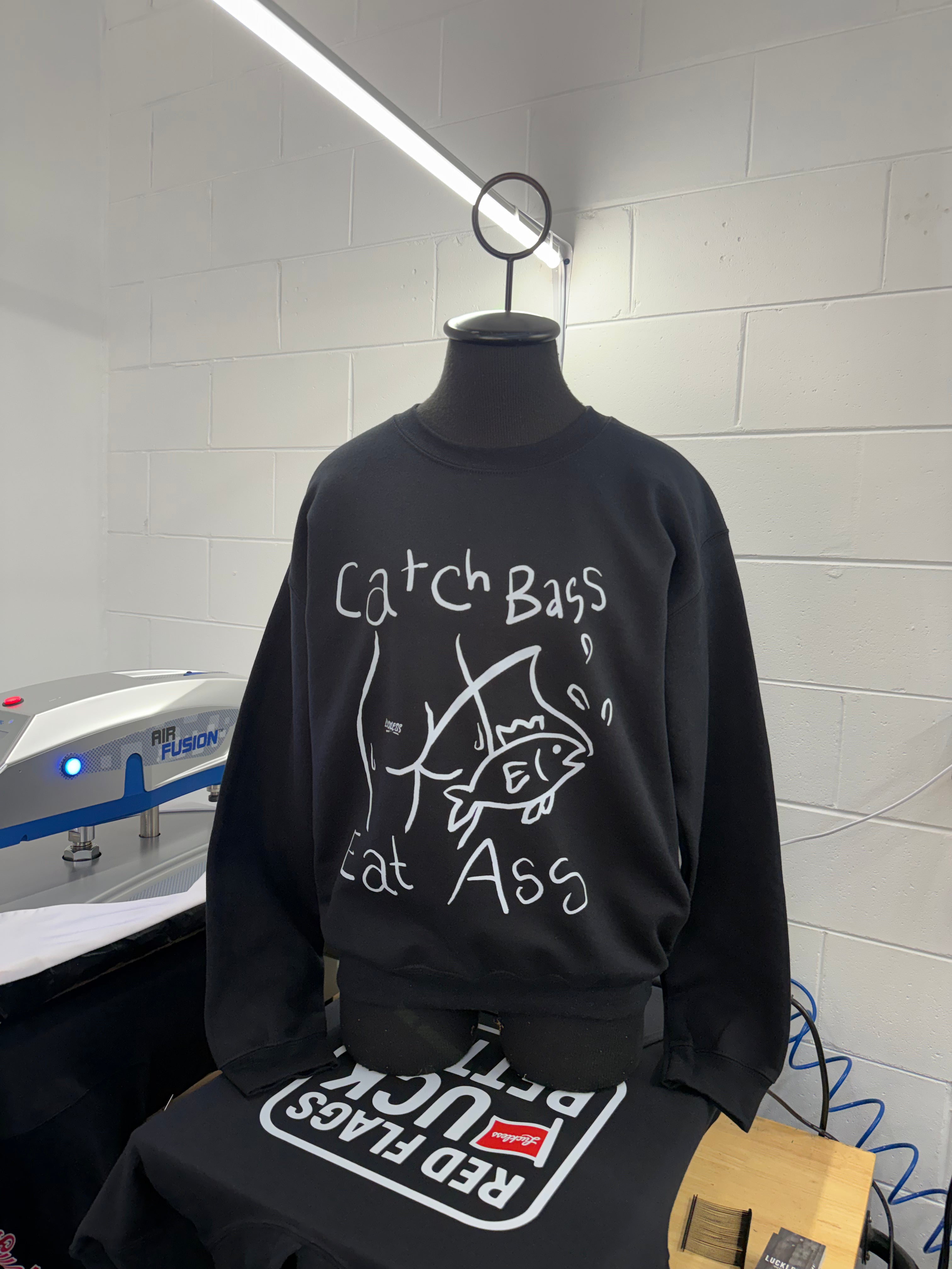 Luckless Outfitters Catch Bass Sweatshirt — detail close-up